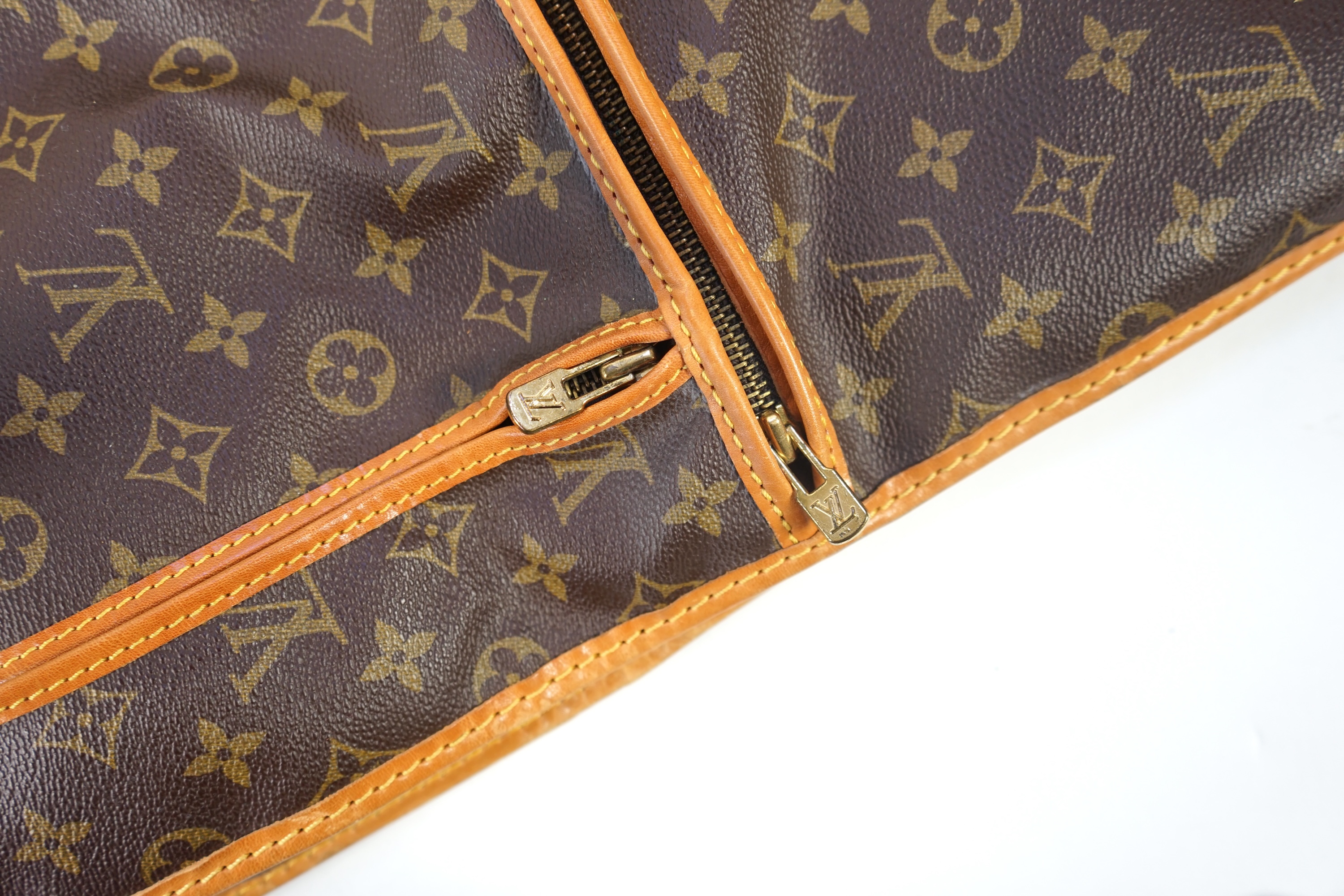 A Louis Vuitton monogram canvas and leather travel bag, 60cm x 53cm x 20cm closed